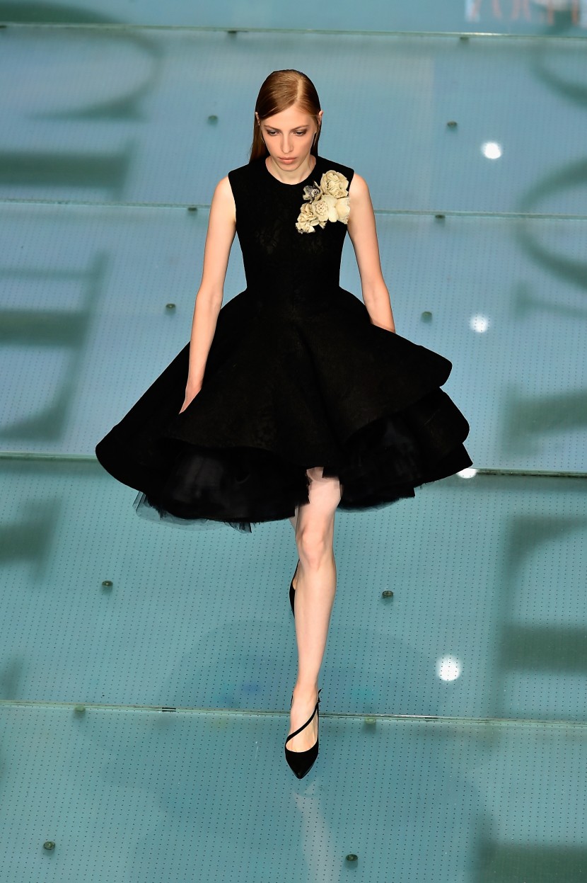 DUBAI, UNITED ARAB EMIRATES - OCTOBER 29:  A model walks the runway at the Talents Fashion show during the Vogue Fashion Dubai Experience 2015 at The Dubai Mall on October 29, 2015 in Dubai, United Arab Emirates.  (Photo by Cedric Ribeiro/Getty Images for Vogue and The Dubai Mall)