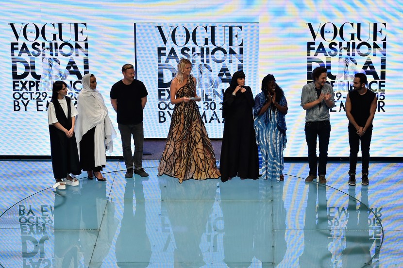 DUBAI, UNITED ARAB EMIRATES - OCTOBER 29: (L-R) Melitta Baumeister, a designer of the label The Kayys, Lee Wood, Carmen Kass, Reem Al Kanhal, Abrima Erwiah, Arthur Arbesser and Krikor Jabotain stand on stage after the Talents Fashion show during the Vogue Fashion Dubai Experience 2015 at The Dubai Mall on October 29, 2015 in Dubai, United Arab Emirates. (Photo by Cedric Ribeiro/Getty Images for Vogue and The Dubai Mall) *** Local Caption *** Melitta Baumeister;Lee Wood;Carmen Kass;Reem Al Kanhal;Abrima Erwiah;Arthur Arbesser;Krikor Jabotain