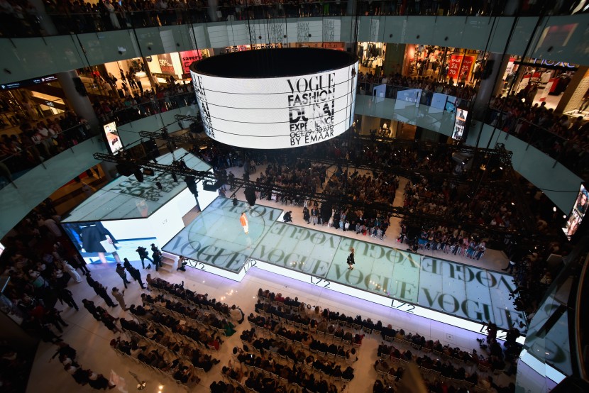 DUBAI, UNITED ARAB EMIRATES - OCTOBER 29:  Models walk the runway at the Talents Fashion show during the Vogue Fashion Dubai Experience 2015 at The Dubai Mall on October 29, 2015 in Dubai, United Arab Emirates.  (Photo by Cedric Ribeiro/Getty Images for Vogue and The Dubai Mall)